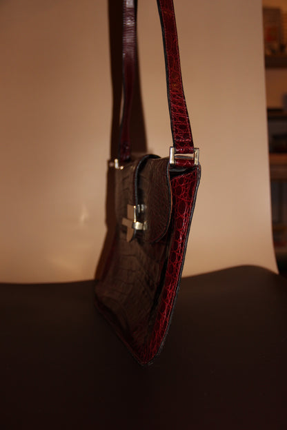 Sac ou pochette en croco caraïbes bordeaux vintage en parfait état