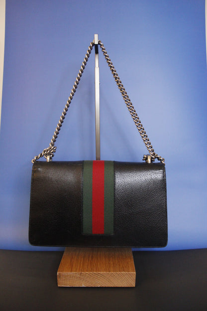 Sac à main GUCCI modèle 'Dionysus' en cuir noir